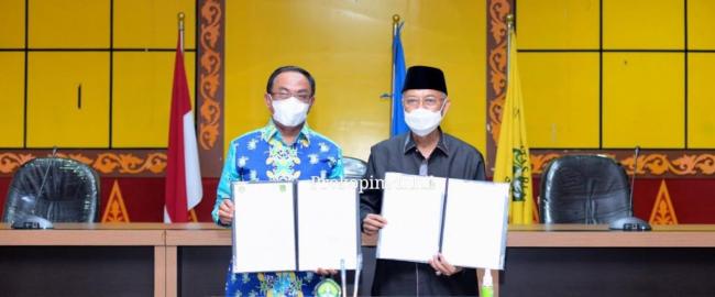 Bupati Inhil HM Wardan MP Teken MoU dengan UNRI