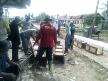 Tak Peduli Siang Malam, SatgasTMMD Ke-106 Tetap Berjibaku